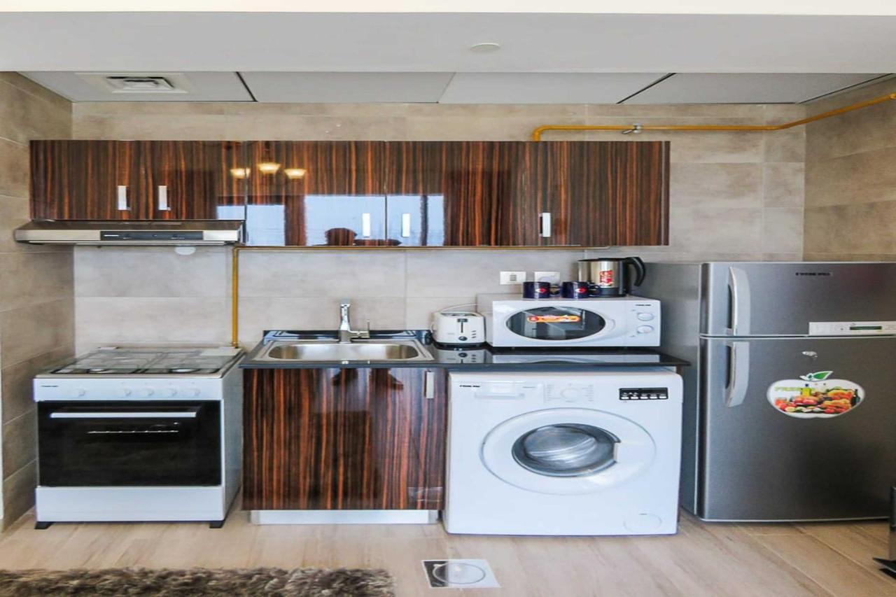 Oyo 860 Studio Apartment, Maya Tower 4, Jumeirah Village Triangle Dubai Exterior foto