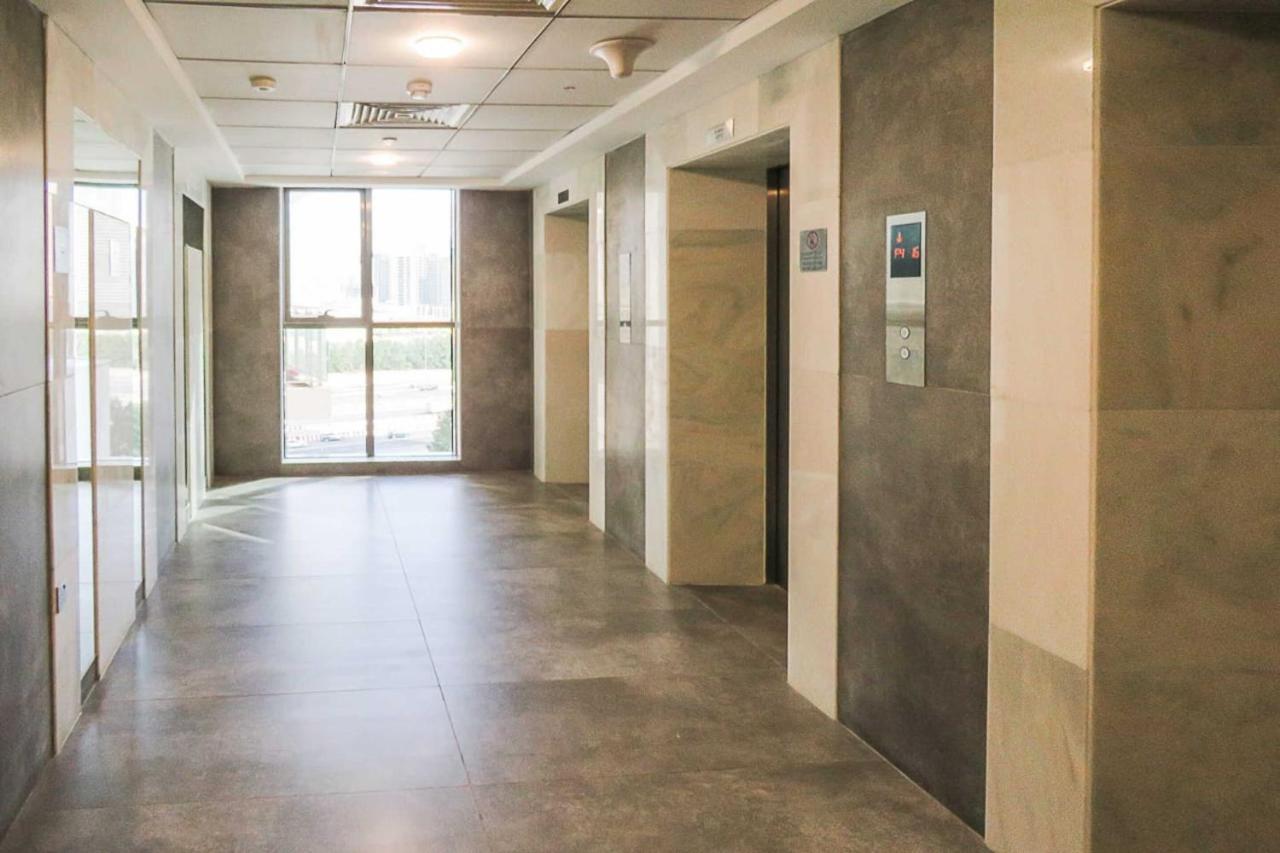 Oyo 860 Studio Apartment, Maya Tower 4, Jumeirah Village Triangle Dubai Exterior foto